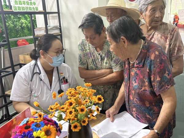 （20230926区中医医院）义诊活动进乡村 解读报告送上门.jpg